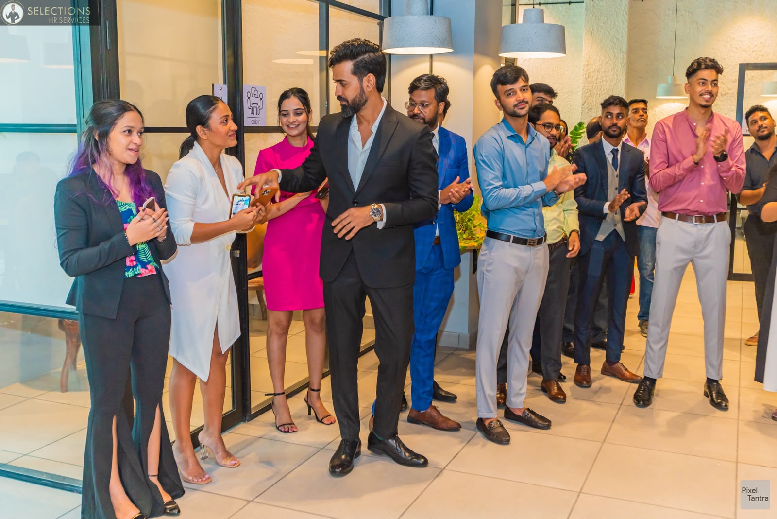 Team celebration at the Selections Sourcing office
